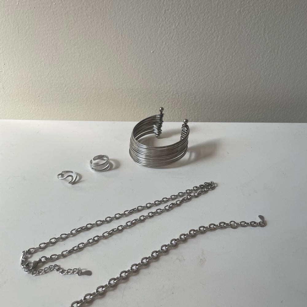 Small lot of stainless steel chain bracelet, neccklace, cuff, rings